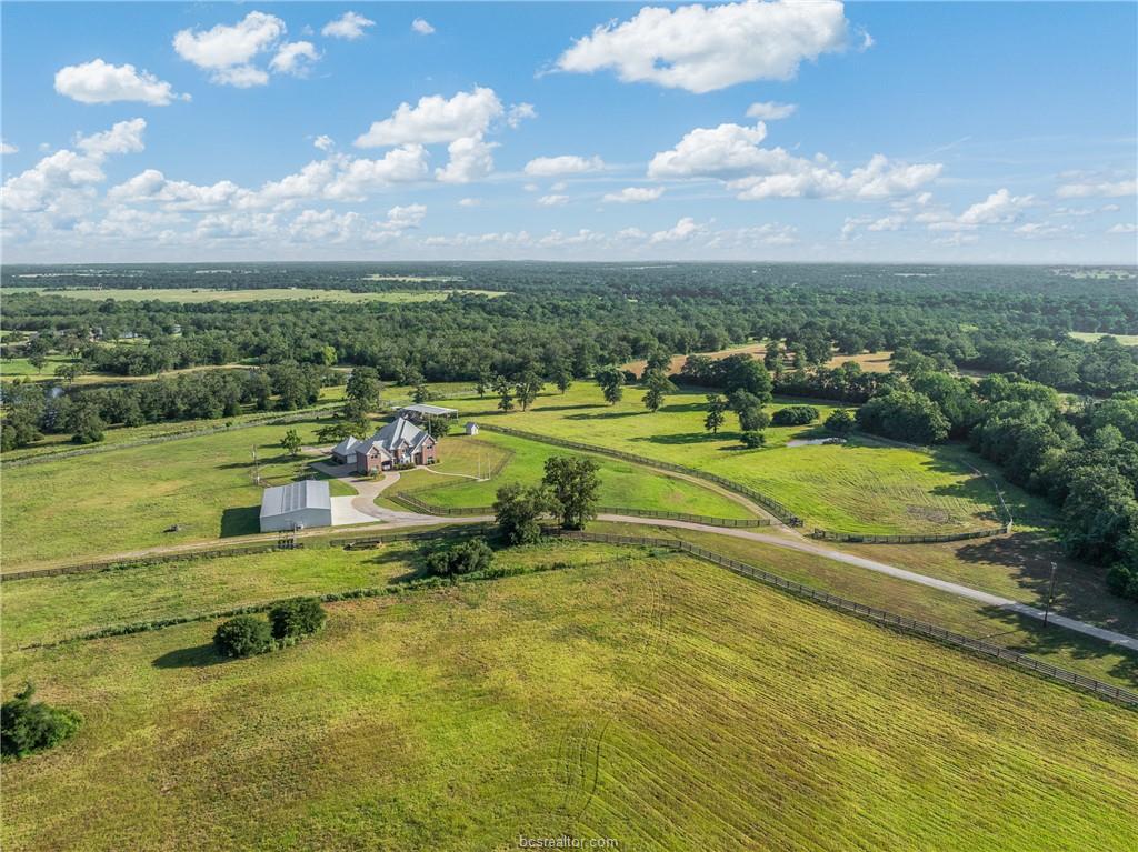 Aerial view of the 173-acre ranch estate at 4845 County Road 119 near Caldwell, Texas