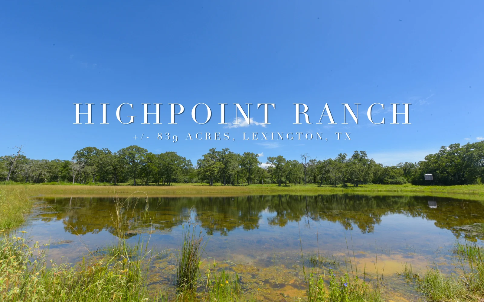 Aerial view of Highpoint Ranch, an 839-acre property near Lexington, Texas, with a stock pond and open pasture